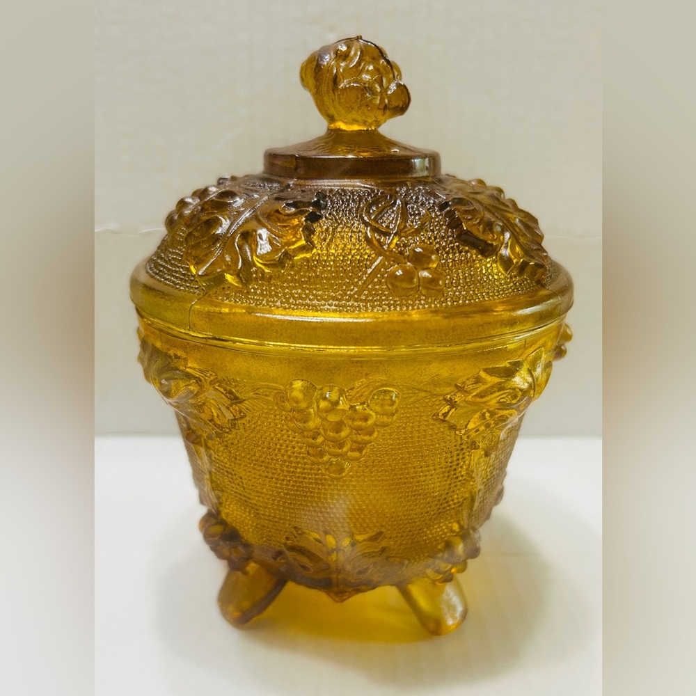 Vintage candy dish, covered & footed.  Amber color is great. Grape harvest.